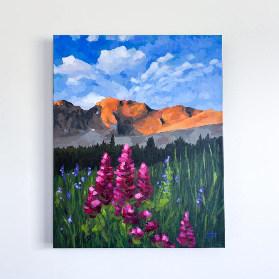 painting featuring mountains and wildflowers